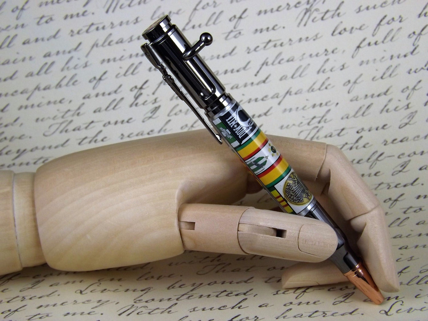 Handmade Bolt Action Pen, Gun Metal mechanism with a Vietnam war campaign body. Perfect for the Veteran. This is a stunning momento.