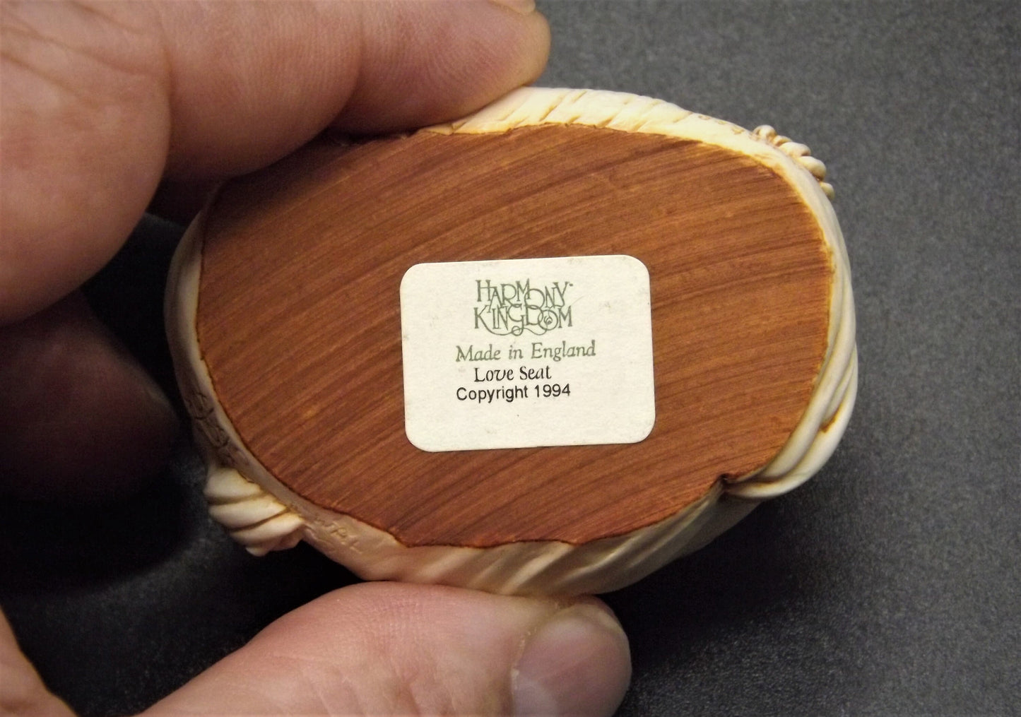 Closeout Sale! Retired 1994 Harmony Kingdom "Love Seat'" Jest Figurine TJWA with original box. Excellent condition.