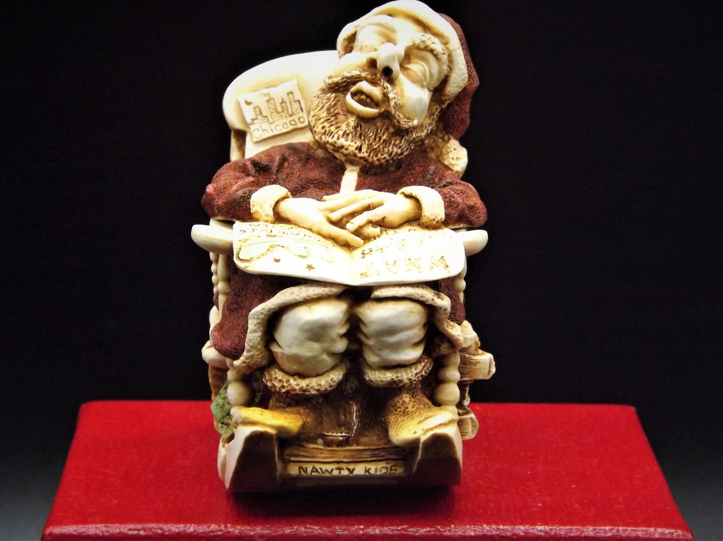 Closeout Sale! Retired 1998 Harmony Kingdom "Jingle Bell Rock'" Jest Figurine TJSESA98 with original box. Excellent condition.