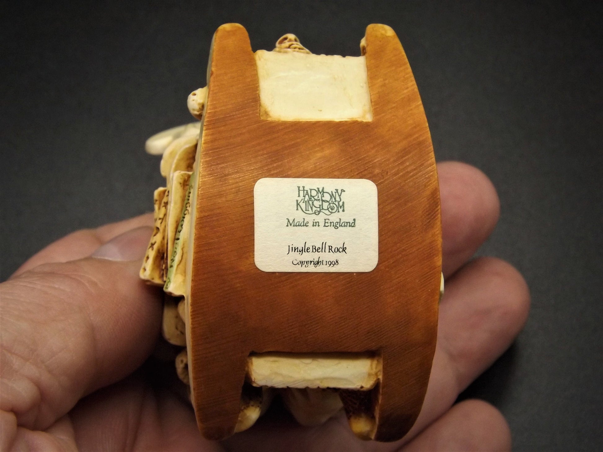 Closeout Sale! Retired 1998 Harmony Kingdom "Jingle Bell Rock'" Jest Figurine TJSESA98 with original box. Excellent condition.