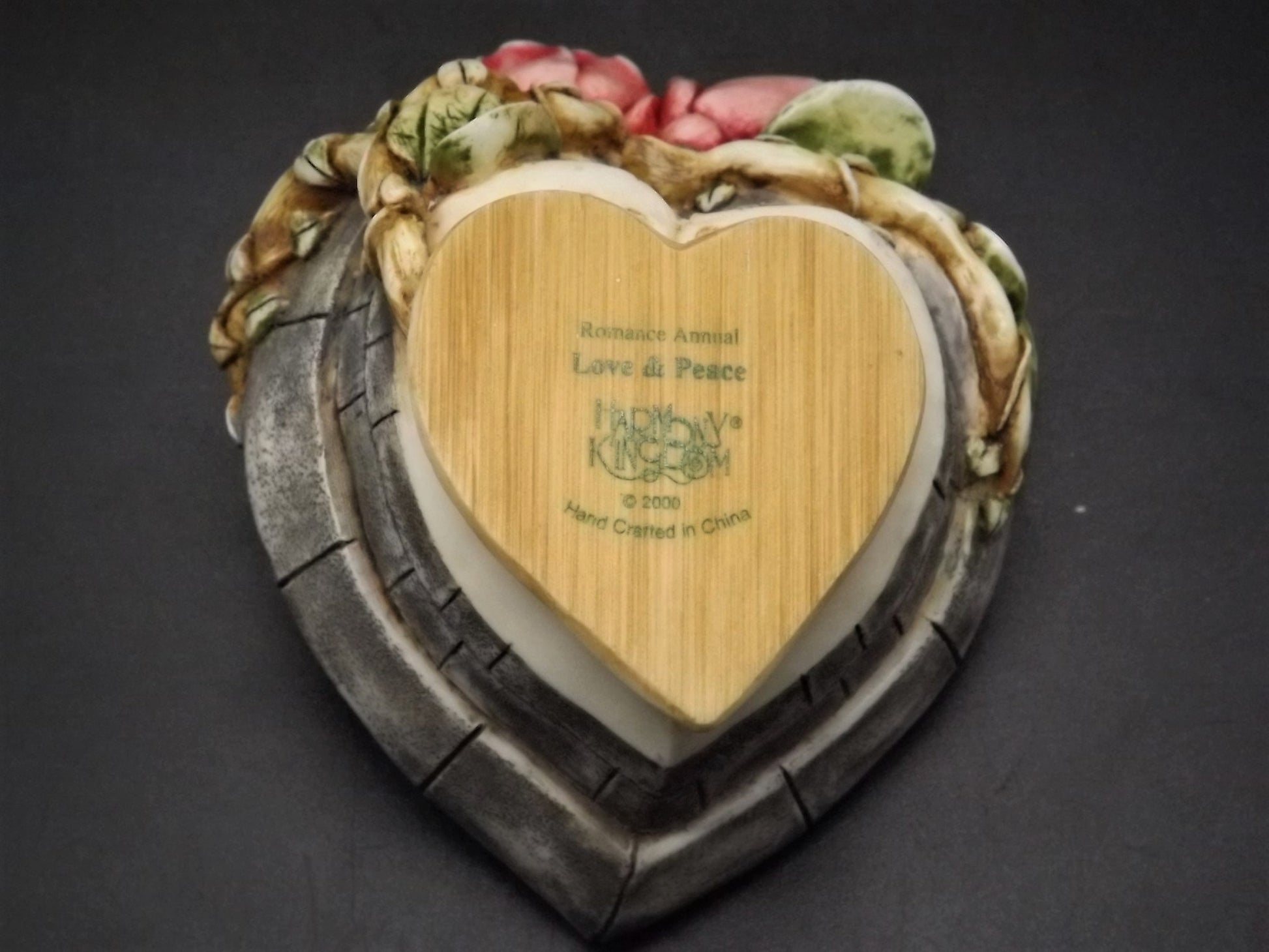 Closeout Sale Retired Harmony Kingdom "Love and Peace'" Special Edition Jest Figurine with box and COA. Excellent condition. Hearts Version!