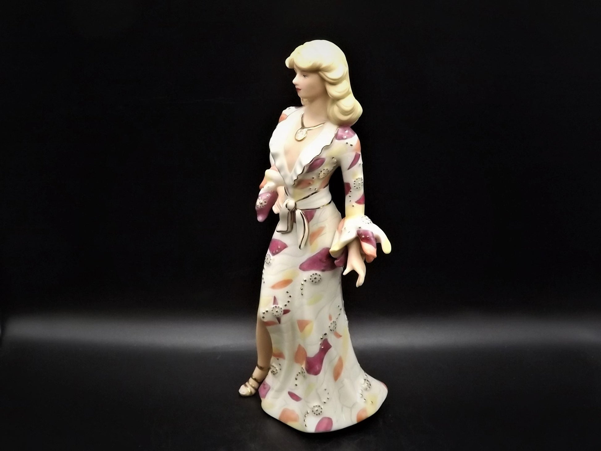 Closeout Sale! Lenox "Disco Darling" lady figurine. Hand Painted porcelain lady figure. Great condition.