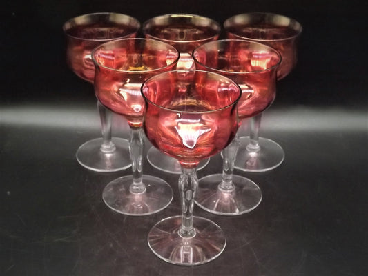 Closeout Sale! Vintage beautiful Cordial Glasses. This set of six Cranberry colored glasses are in perfect condition with no flaws detected.