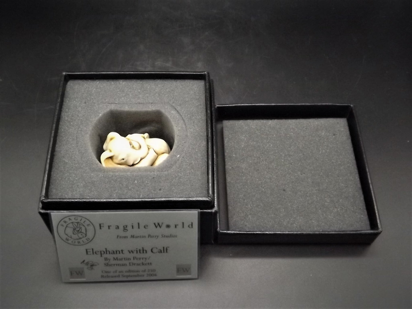 Fragile World "Elephant with Calf" Figurine by Martin Perry Studios. Limited Edition to only 250 pieces with original box and COA. Excellent