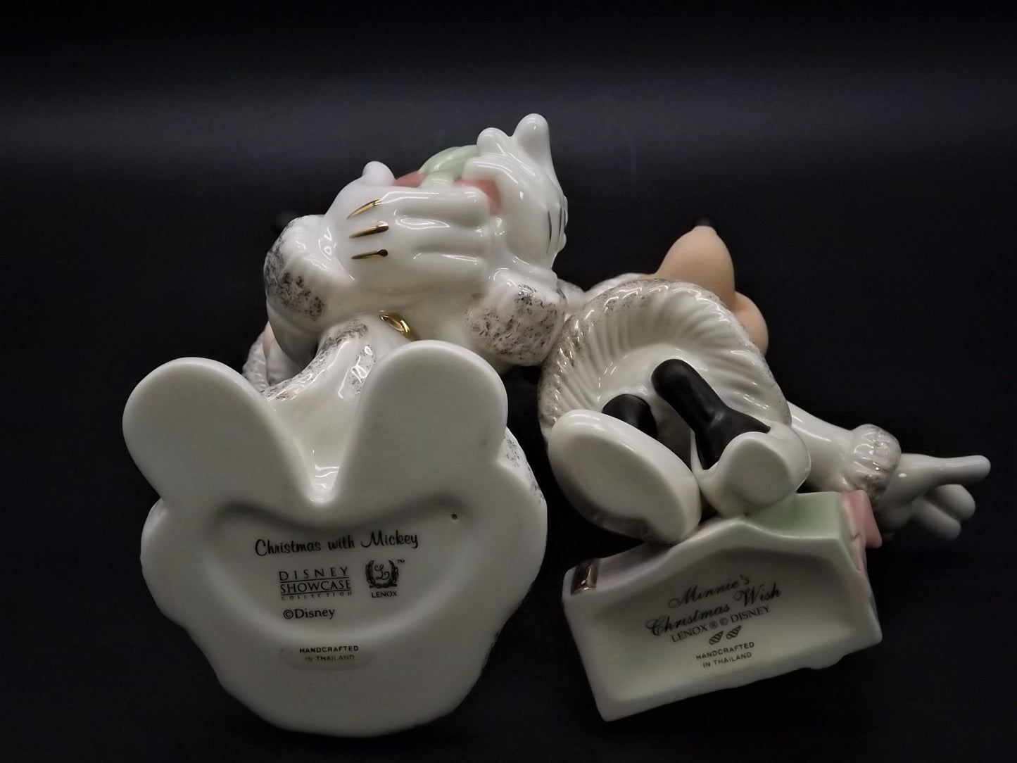 Lenox Christmas with Mickey and Minnie's Christmas Wish Porcelain Figurines. Minnie is holding Mistletoe and Mickey with a present. Great!
