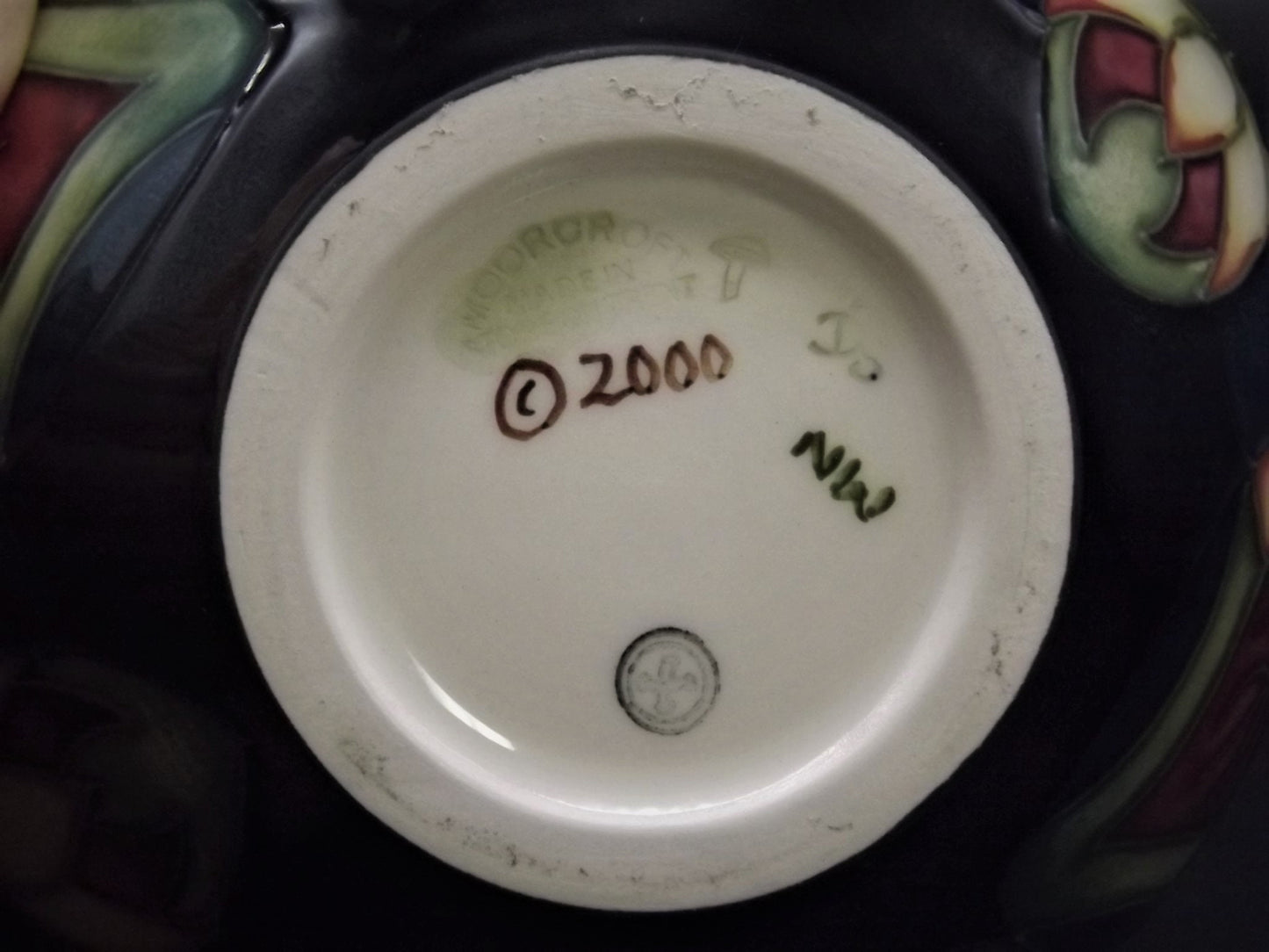 Vintage 2002 Moorcroft "Trillium" Vase. This piece is stunning and in excellent condition.