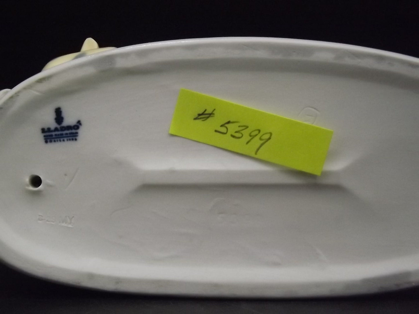 Vintage 1987 Lladro "A time to rest" #5399 no box or COA . Excellent condition! Young Man relaxing on a journey.