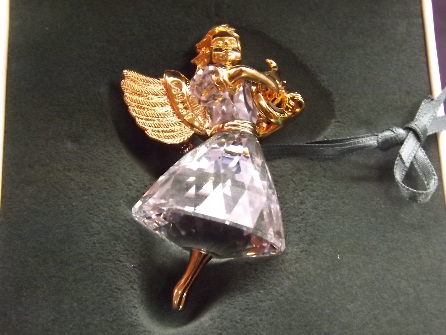 Vintage Swarovski Crystal Memories 1998 "Angel Playing a Harp" Figurine. Excellent Condition with original box.