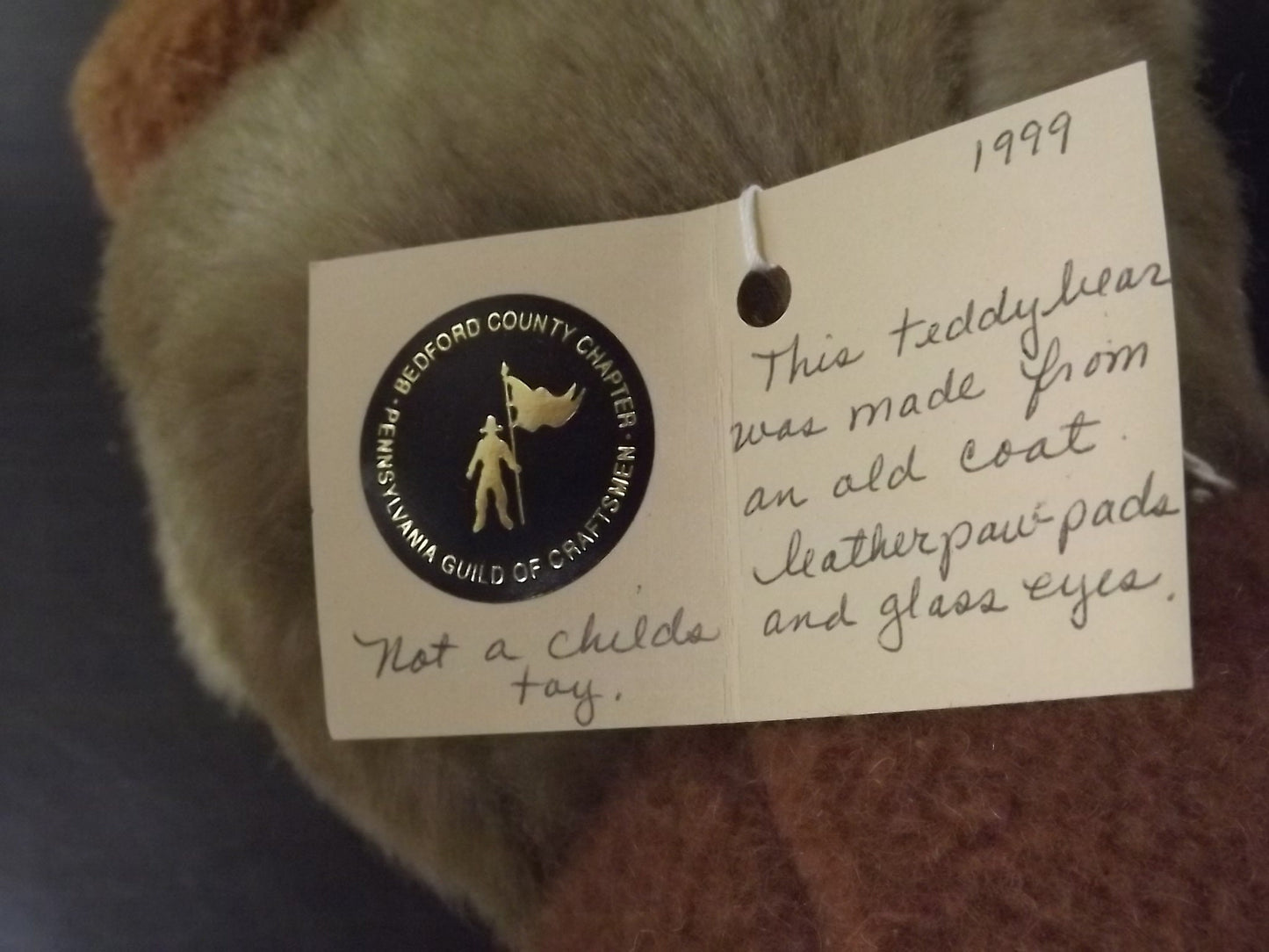 Vintage 1999 artist crafted Teddy Bear. This jointed bear is well crafted by Karen Nicodemus who creates by repurposing old coats into art.