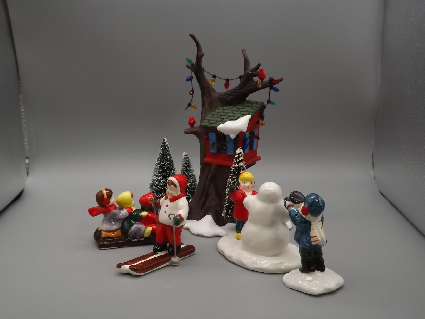 Vintage Snow Village "Kids Tree House and Snow Kids" figurines seasonal display children playing in the snow. With box