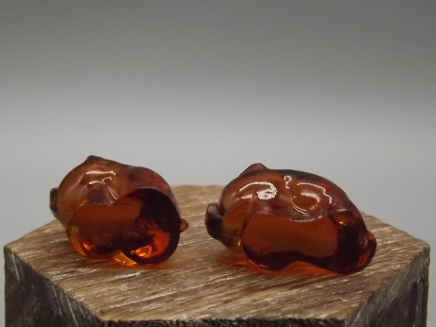 Heisey by Imperial Amber glass standing and sitting piglets set.
