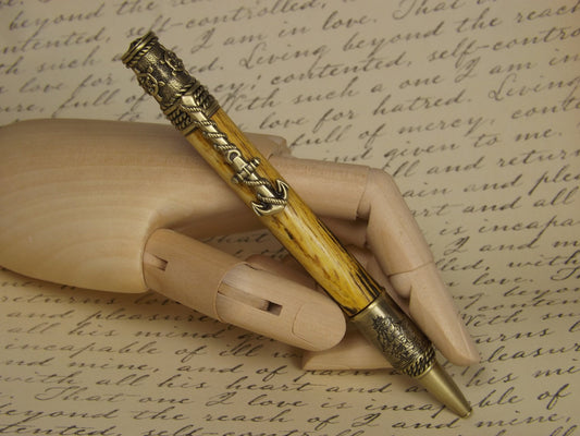 Handmade nautical pen, antique bronze with a dyed and stabilized tiger oak wood body.