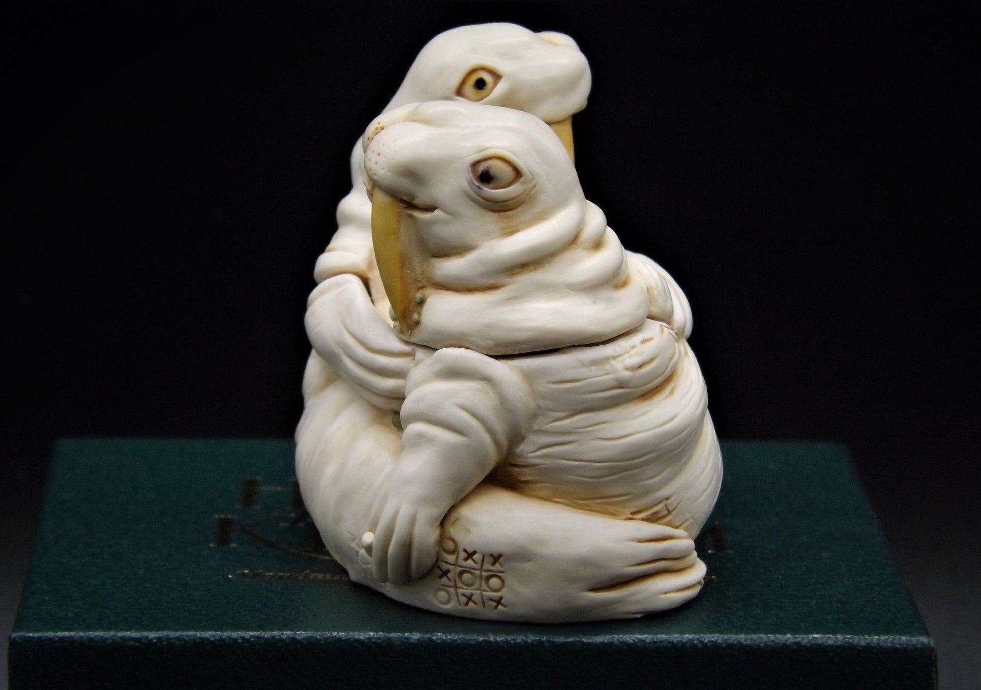 Closeout Sale! Retired 1994 Harmony Kingdom "Love Seat'" Jest Figurine TJWA with original box. Excellent condition.