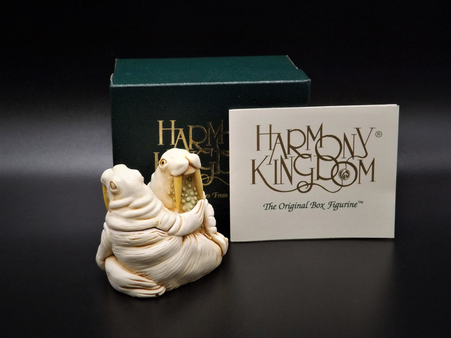 Closeout Sale! Retired 1994 Harmony Kingdom "Love Seat'" Jest Figurine TJWA with original box. Excellent condition.
