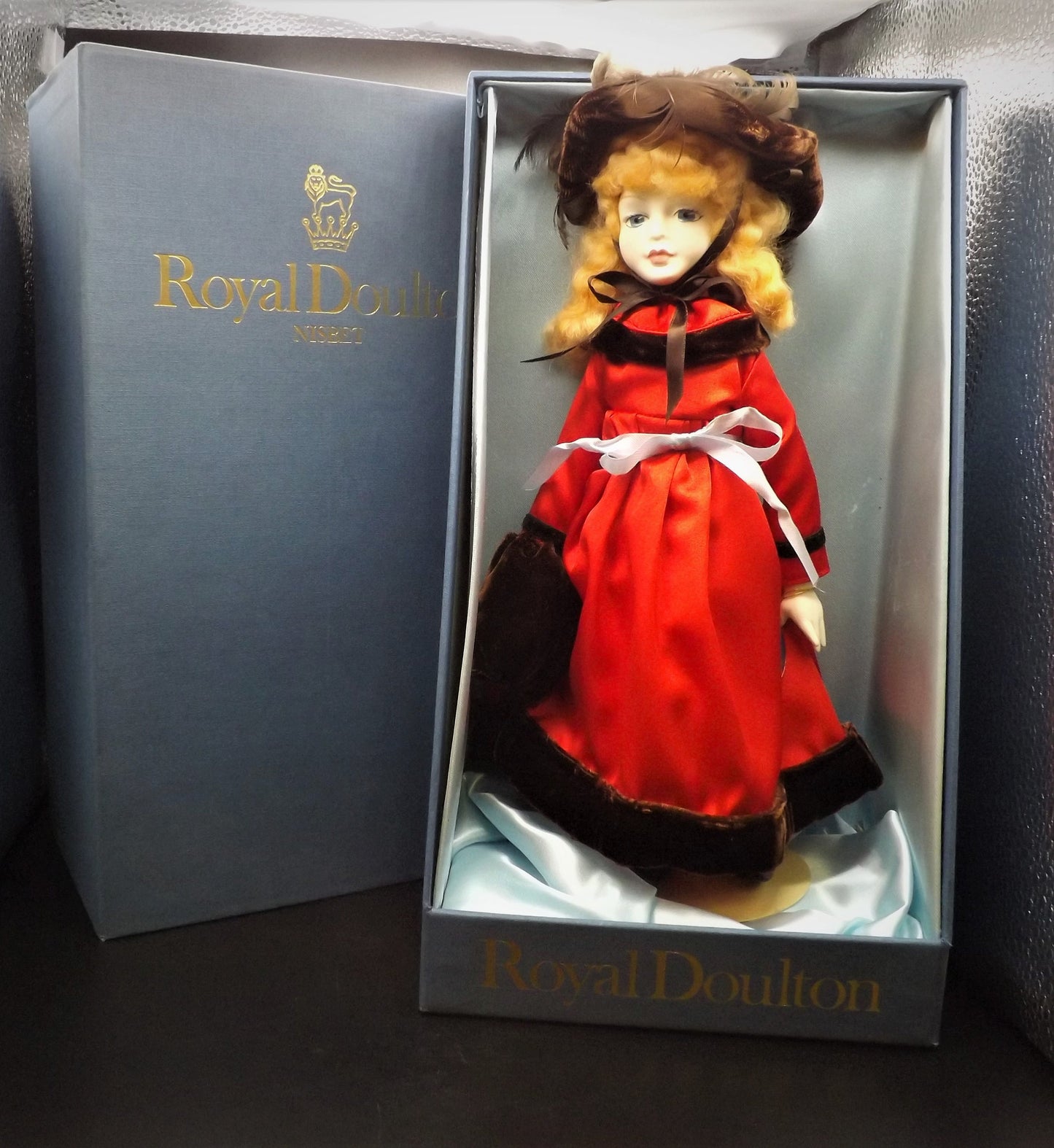 Vintage original Royal Doulton Nisbet Doll never removed from box! This is Winter #7603 excellent condition.