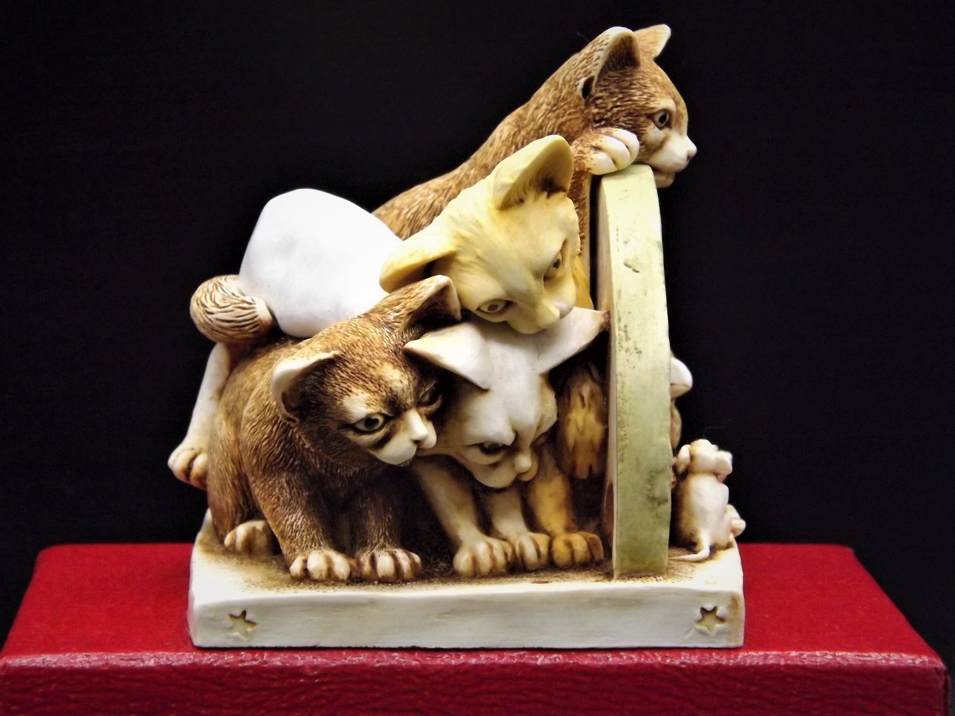 Retired 1998 Harmony Kingdom "Sneak Preview'" Jest Figurine TJICE98 with original box. Excellent condition.