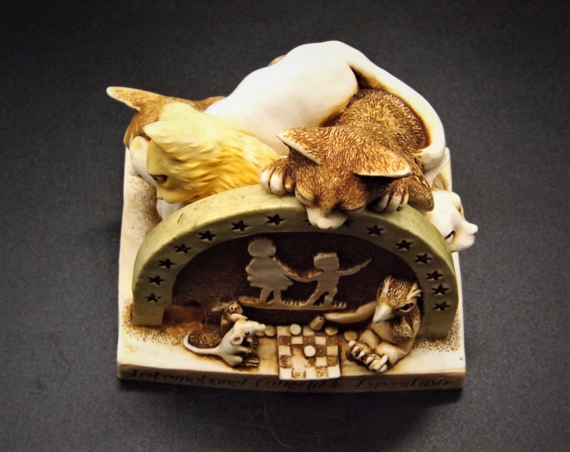 Retired 1998 Harmony Kingdom "Sneak Preview'" Jest Figurine TJICE98 with original box. Excellent condition.