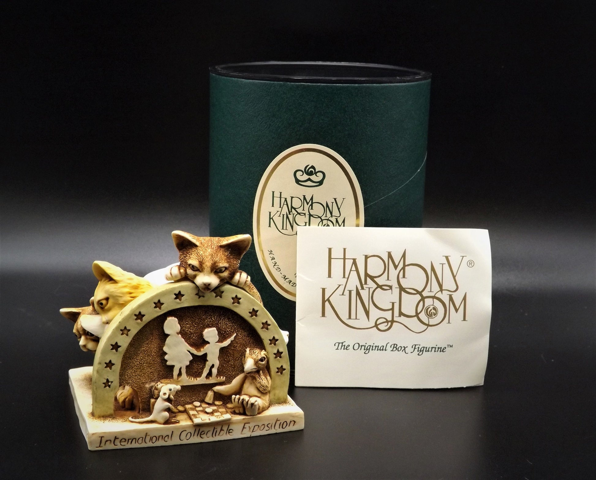 Retired 1998 Harmony Kingdom "Sneak Preview'" Jest Figurine TJICE98 with original box. Excellent condition.