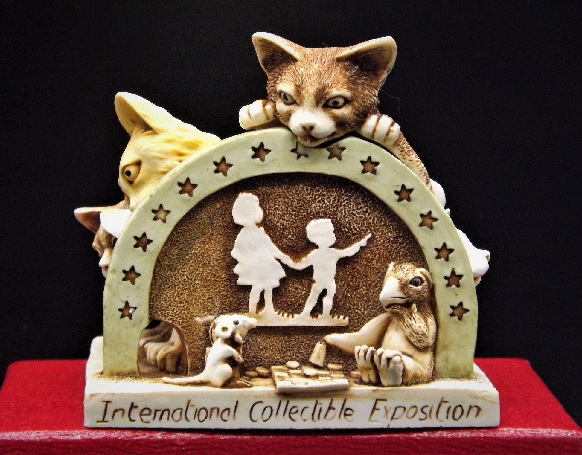 Retired 1998 Harmony Kingdom "Sneak Preview'" Jest Figurine TJICE98 with original box. Excellent condition.