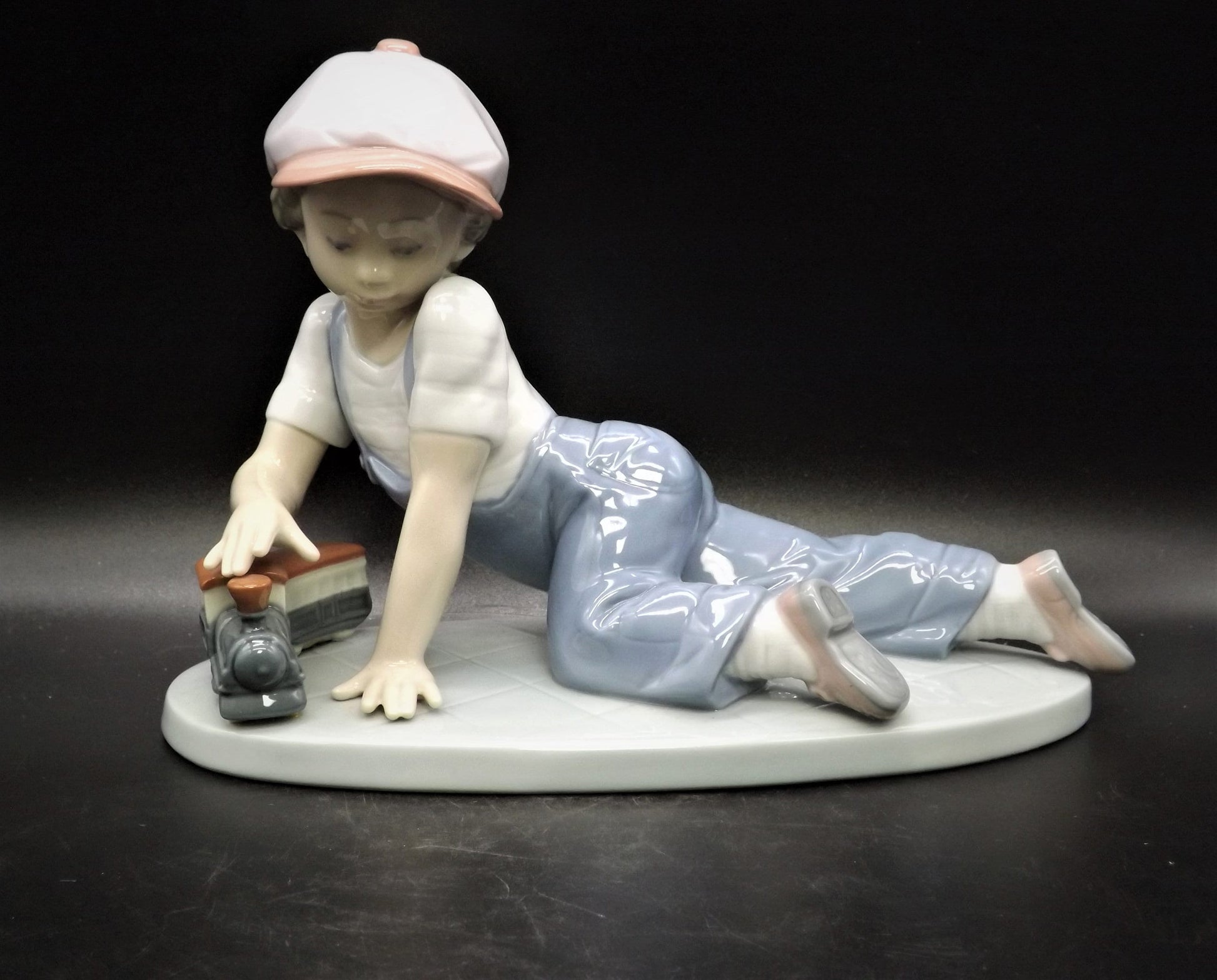 Vintage Lladro Figurine "All Aboard" #7619: Boy with Train