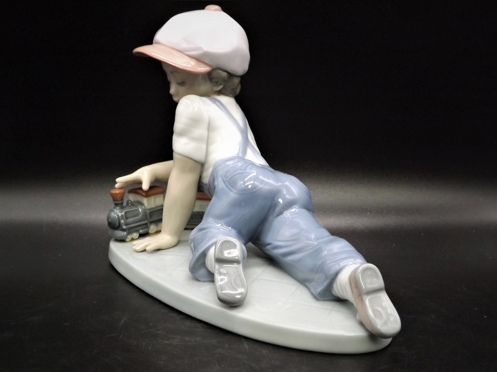 Vintage Lladro Figurine "All Aboard" #7619: Boy with Train