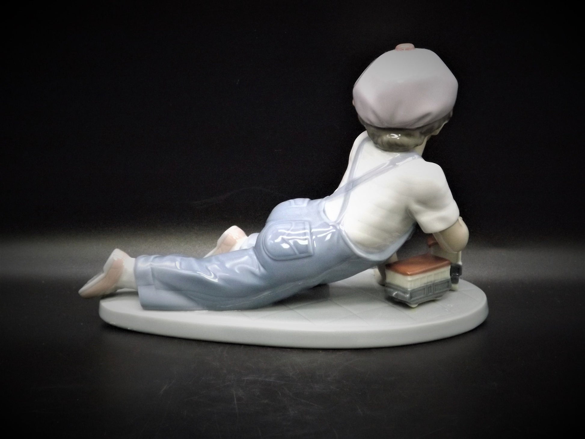 Vintage Lladro "All Aboard" #7619 with original box. Young Boy playing with his trains. Completely intact! Excellent condition!