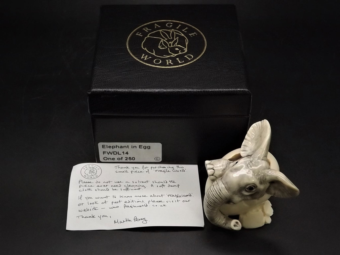 Fragile World "Elephant in Egg" Figurine by Martin Perry Studios. Limited Edition to only 250 pieces with original box and COA. Excellent!