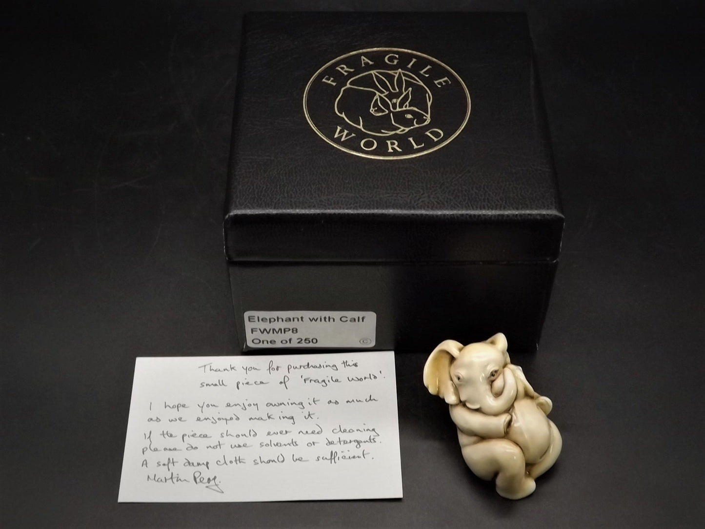Fragile World "Elephant with Calf" Figurine by Martin Perry Studios. Limited Edition to only 250 pieces with original box and COA. Excellent