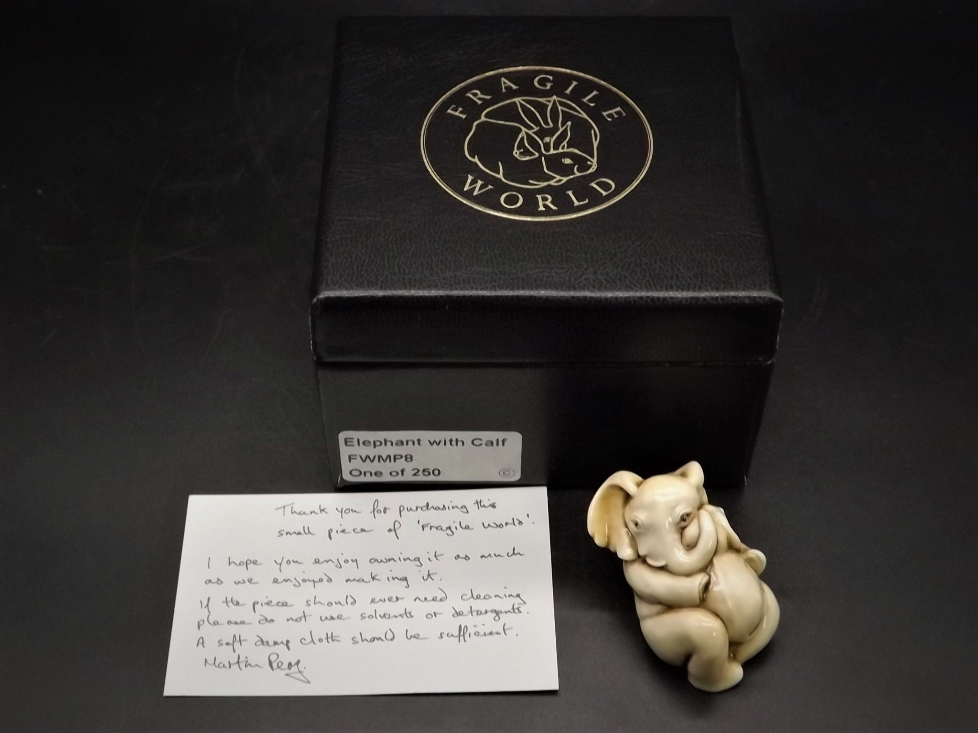 Fragile World "Elephant with Calf" Figurine by Martin Perry Studios. Limited Edition to only 250 pieces with original box and COA. Excellent