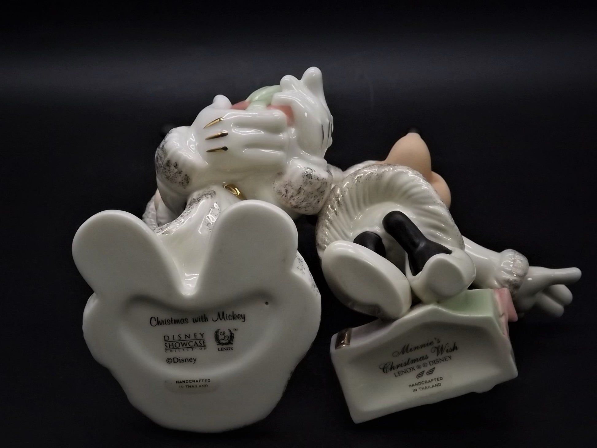 Lenox Christmas with Mickey and Minnie's Christmas Wish Porcelain Figurines. Minnie is holding Mistletoe and Mickey with a present. Great!
