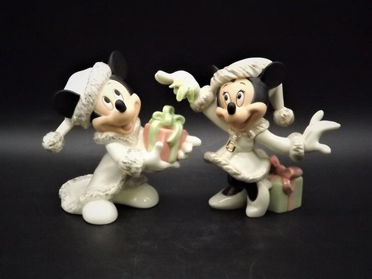 Lenox Christmas with Mickey and Minnie's Christmas Wish Porcelain Figurines. Minnie is holding Mistletoe and Mickey with a present. Great!