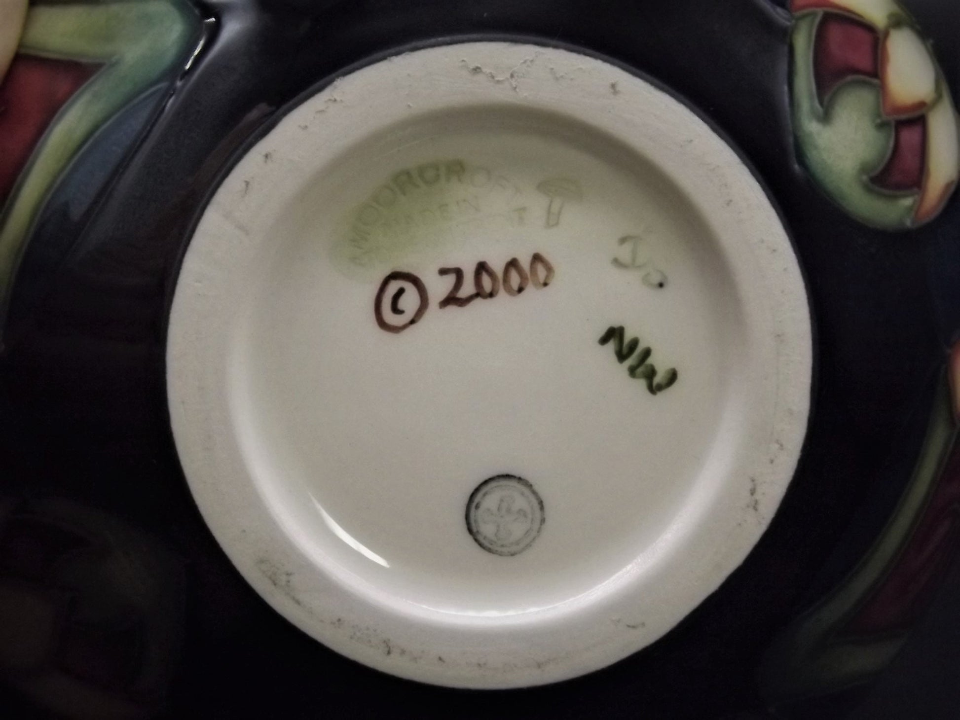 Vintage 2002 Moorcroft "Trillium" Vase. This piece is stunning and in excellent condition.