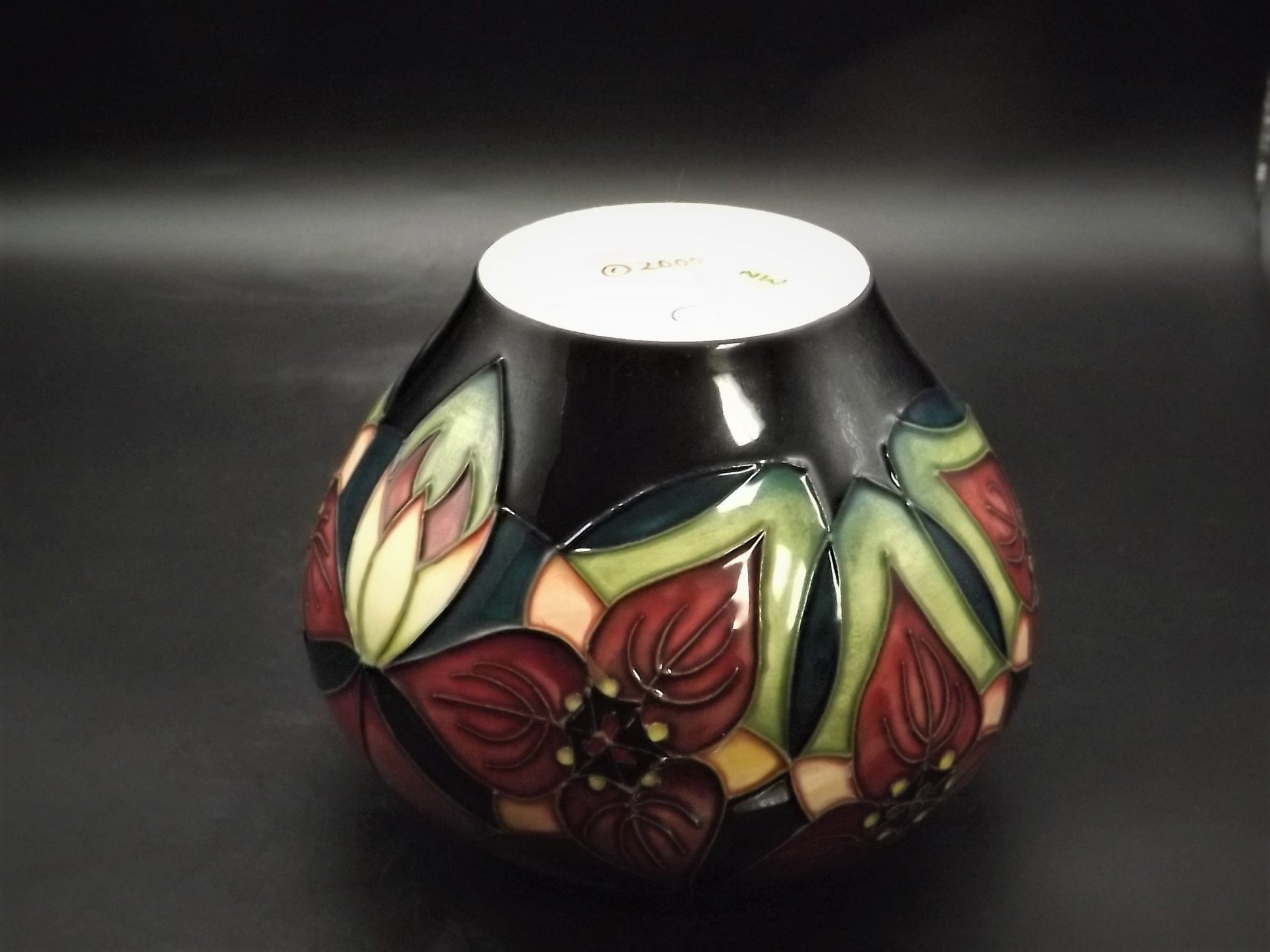 Vintage 2002 Moorcroft "Trillium" Vase. This piece is stunning and in excellent condition.