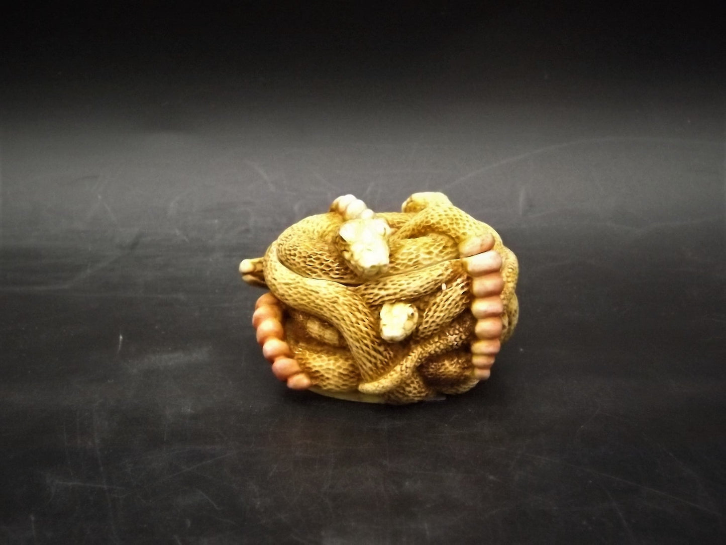 Retired 1993 Harmony Kingdom "All Tied Up" snakes piece Excellent condition. No Box.