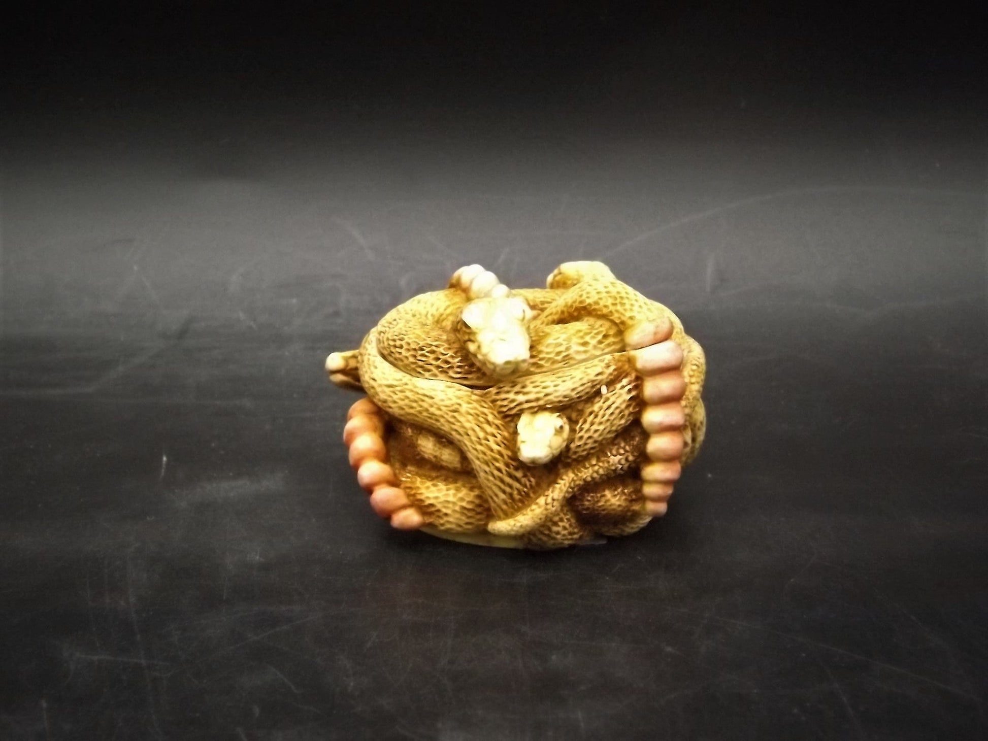 Retired 1993 Harmony Kingdom "All Tied Up" snakes piece Excellent condition. No Box.