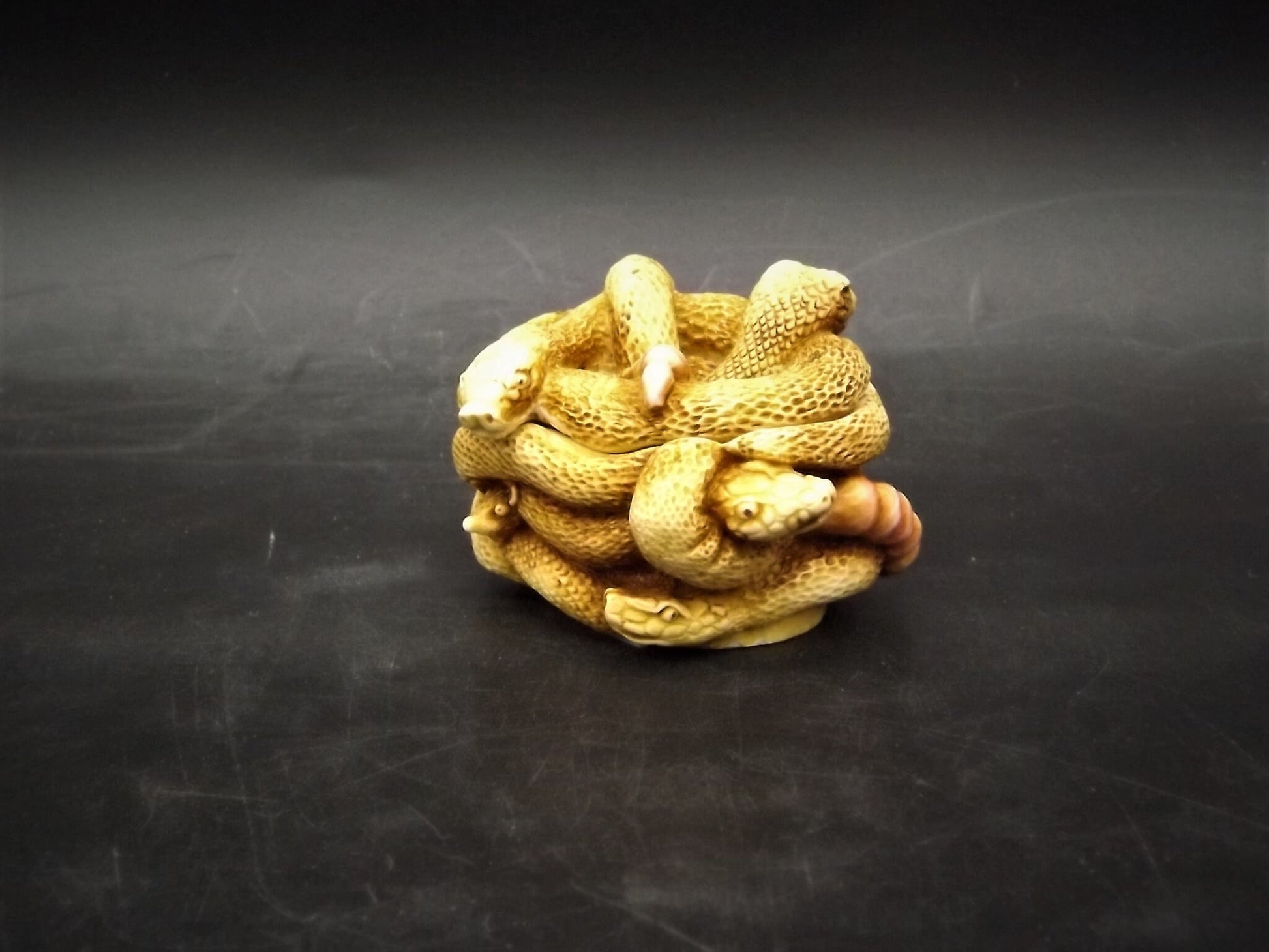 Retired 1993 Harmony Kingdom "All Tied Up" snakes piece Excellent condition. No Box.