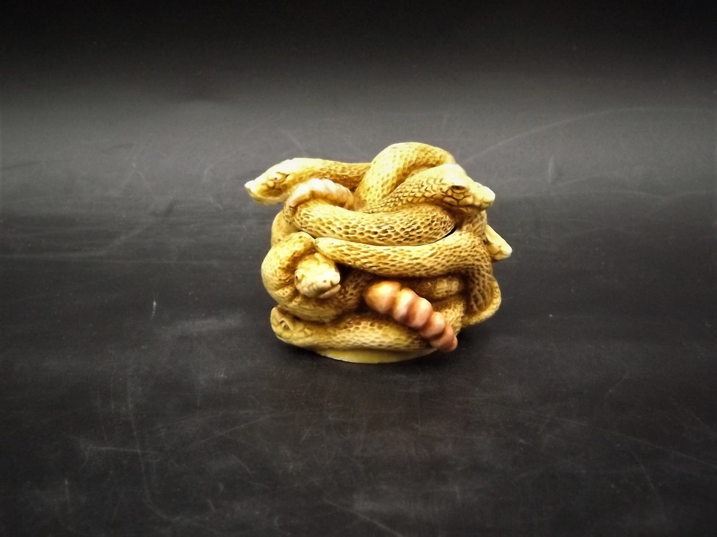 Retired 1993 Harmony Kingdom "All Tied Up" snakes piece Excellent condition. No Box.