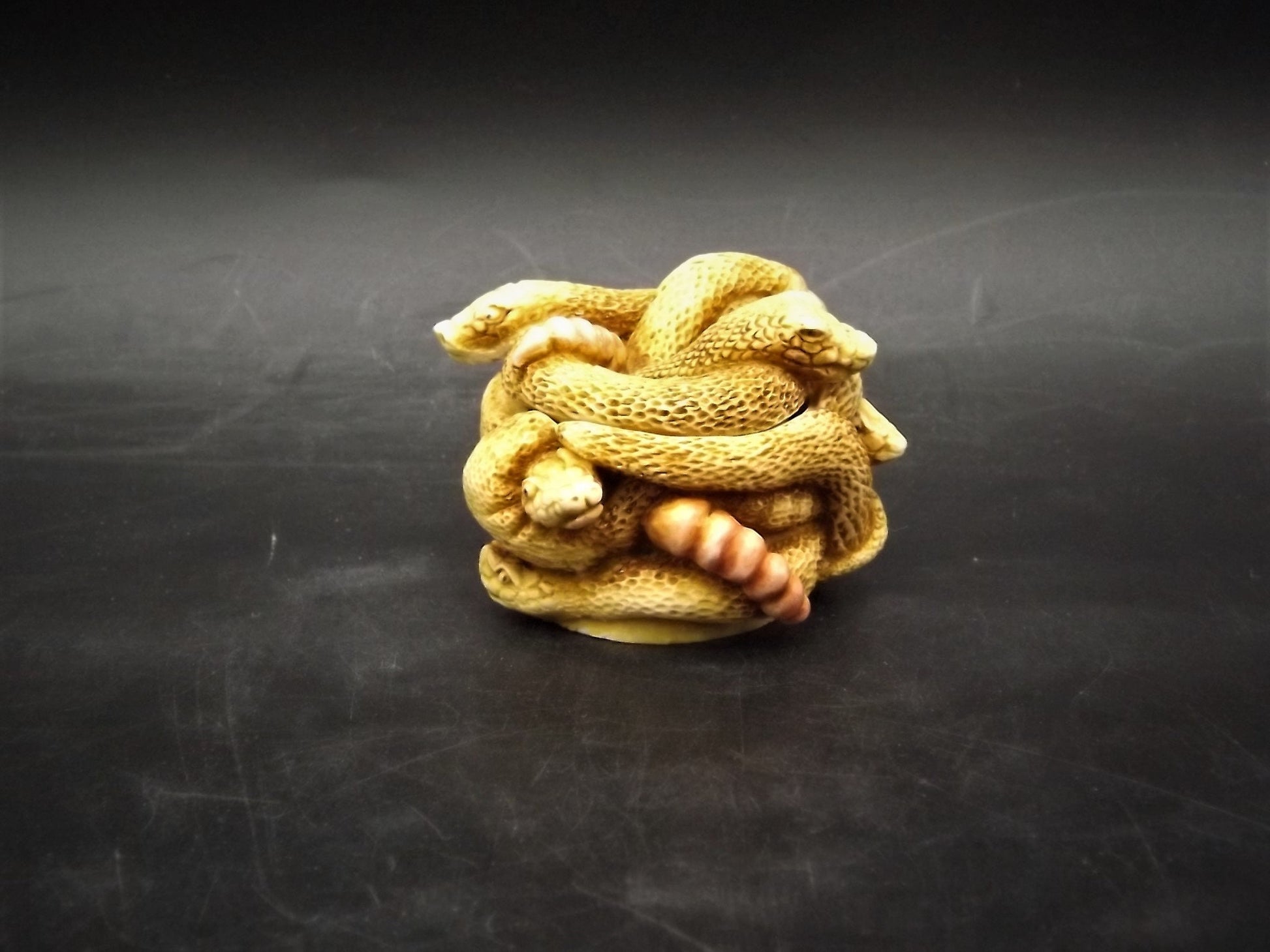Retired 1993 Harmony Kingdom "All Tied Up" snakes piece Excellent condition. No Box.
