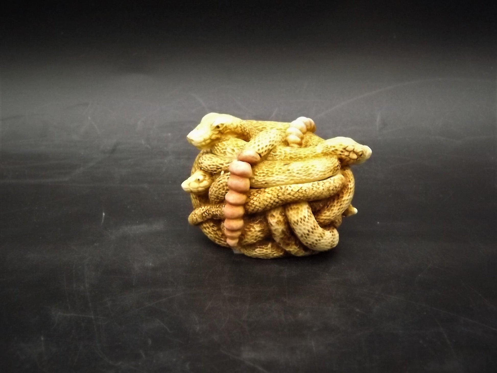 Retired 1993 Harmony Kingdom "All Tied Up" snakes piece Excellent condition. No Box.