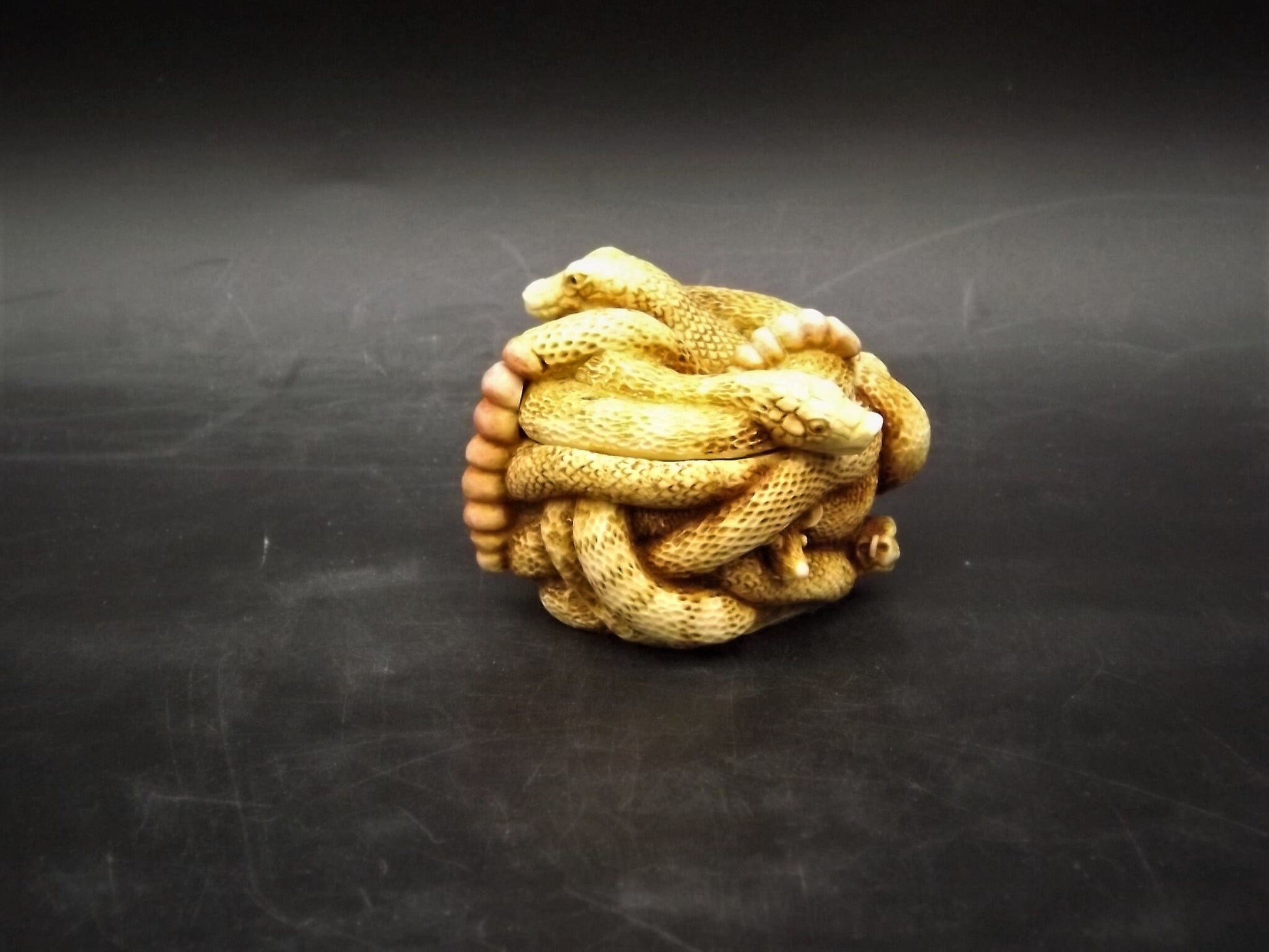 Retired 1993 Harmony Kingdom "All Tied Up" snakes piece Excellent condition. No Box.