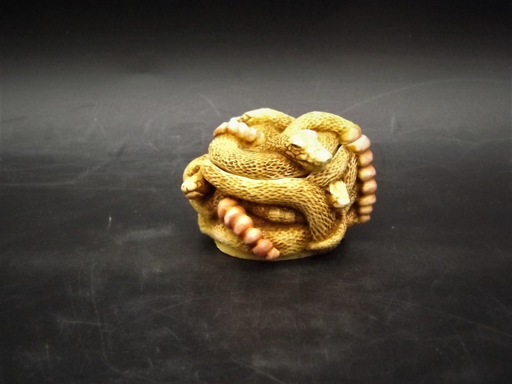 Retired 1993 Harmony Kingdom "All Tied Up" snakes piece Excellent condition. No Box.