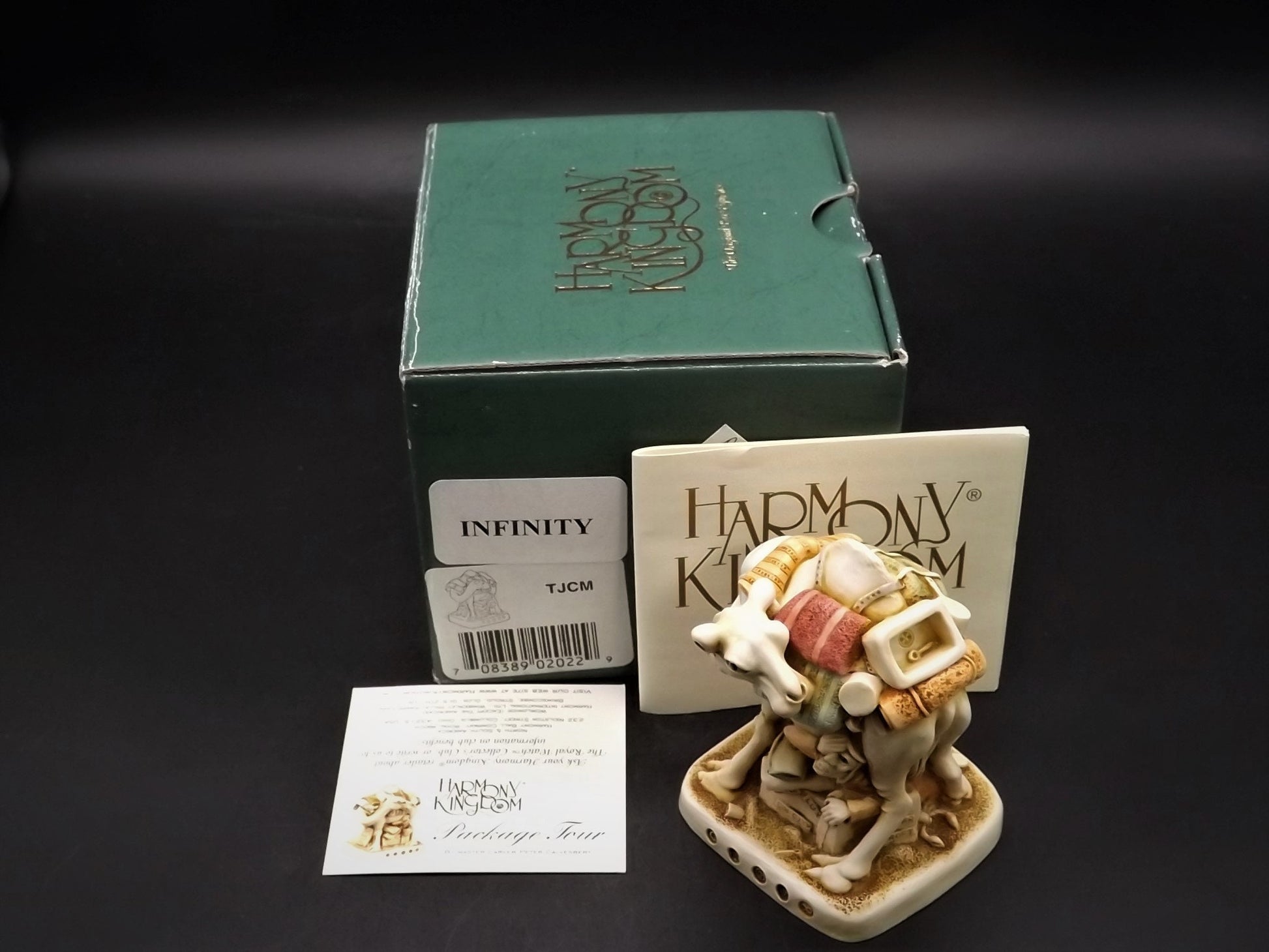Retired 1998 Harmony Kingdom "Package tour" Infinity version piece Excellent condition with original box and COA.