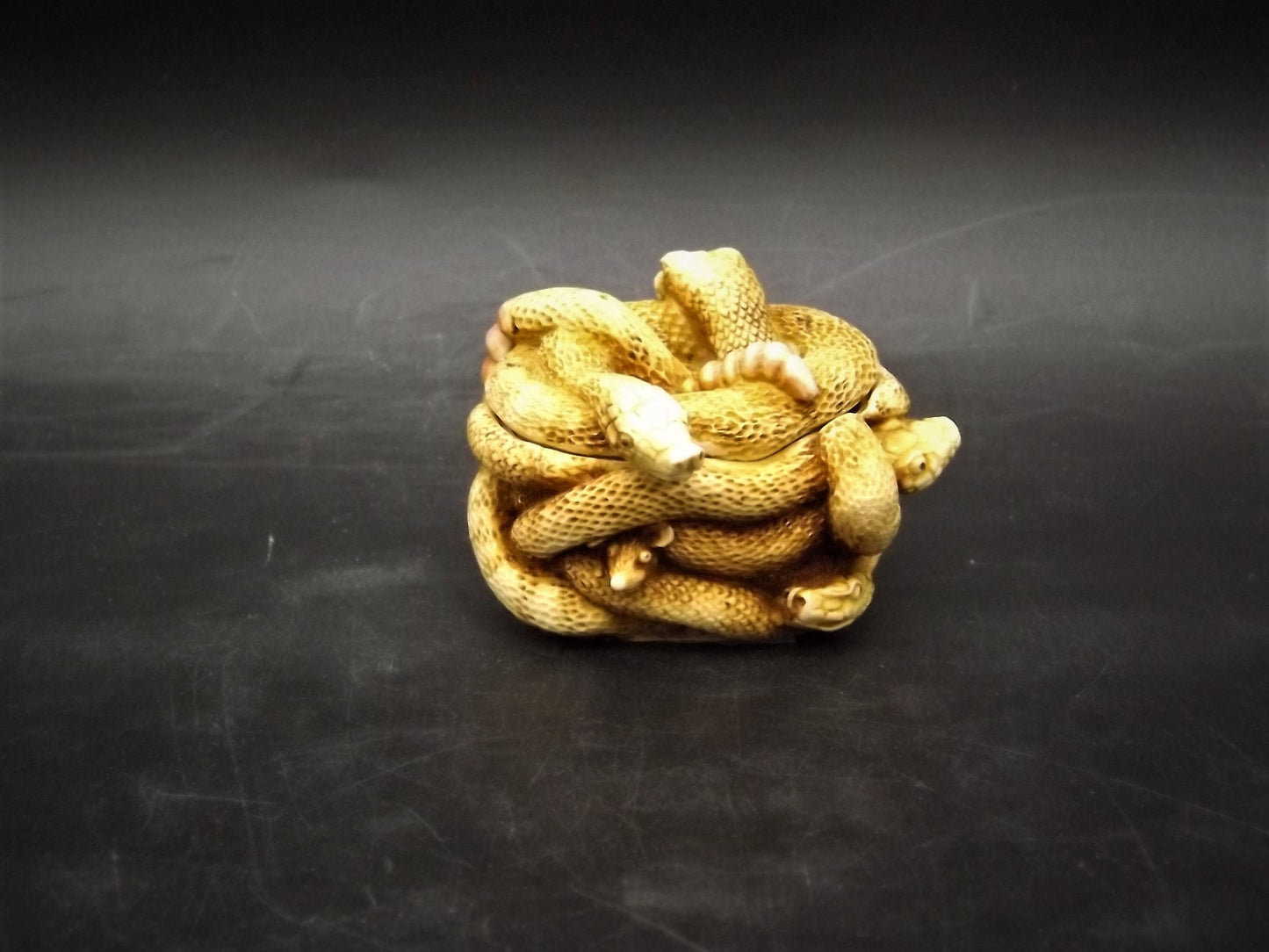 Retired 1993 Harmony Kingdom "All Tied Up" snakes piece Excellent condition. No Box.