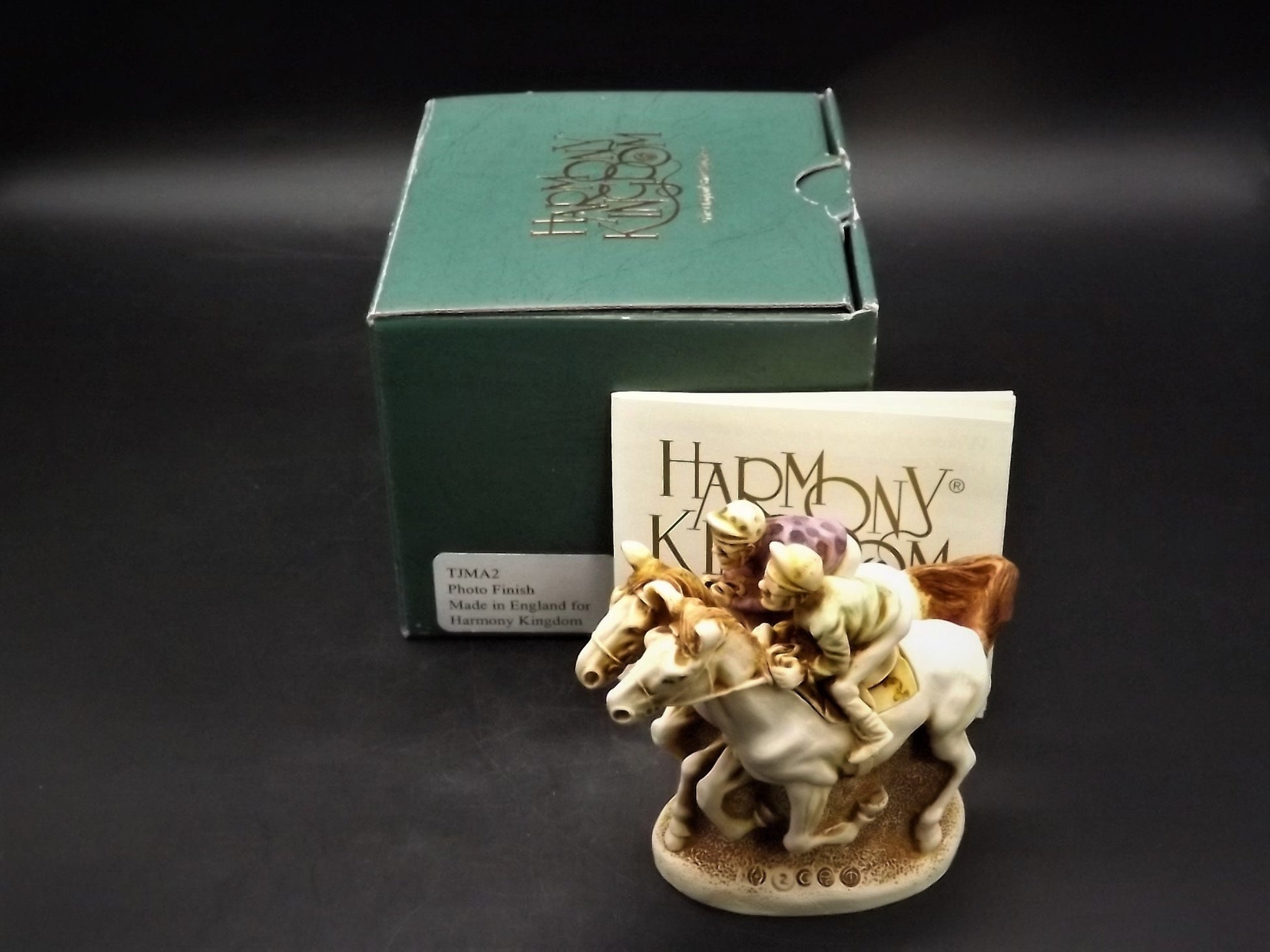 Retired 1996 Harmony Kingdom "Photo Finish" piece Excellent condition with original box.