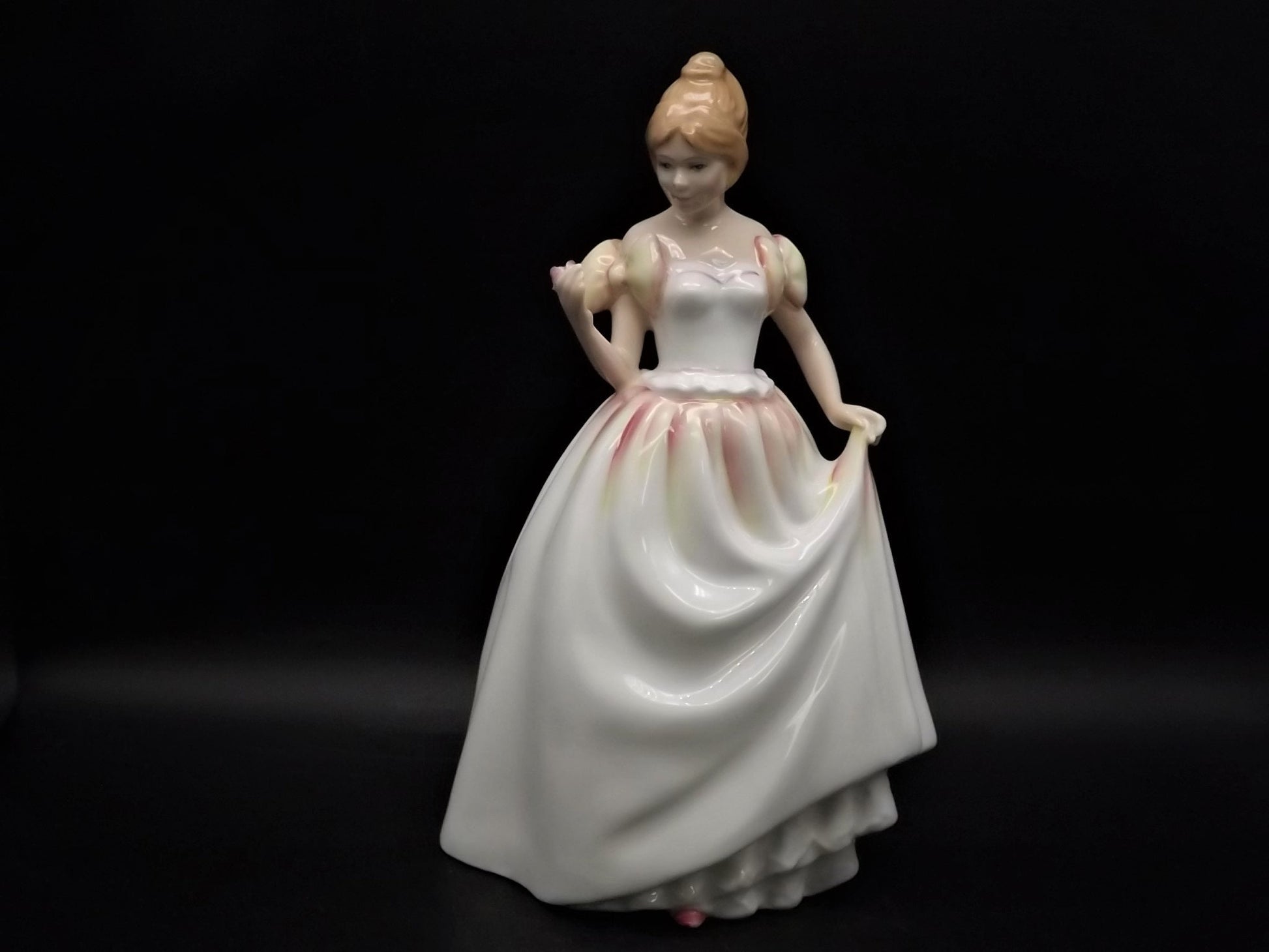 Vintage Royal Doulton "Gift of Love" figurine HN 3427. Excellent condition young lady with a flower!