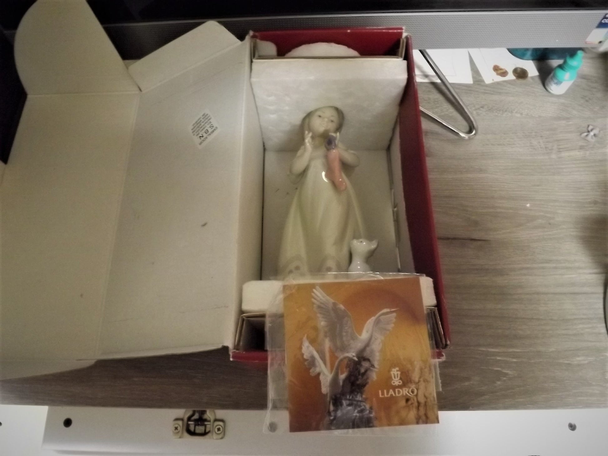 Vintage 1999 Lladro Night before Christmas Collection "A Stocking for kitty" #6669 with original box. Child hanging a stocking for her pet.