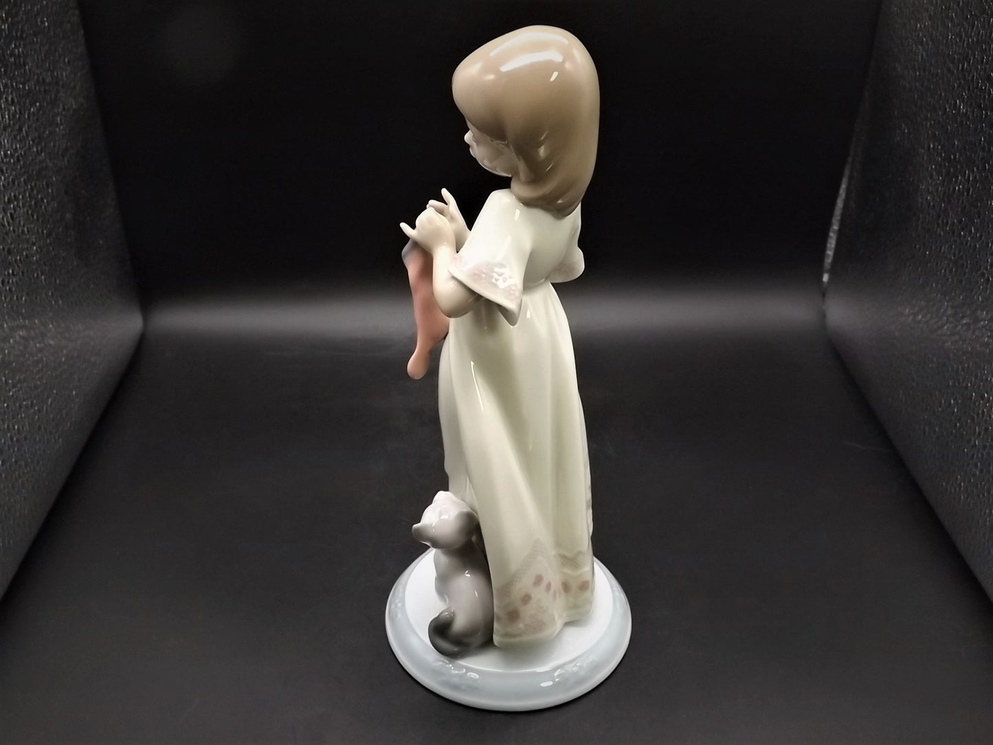 Vintage 1999 Lladro Night before Christmas Collection "A Stocking for kitty" #6669 with original box. Child hanging a stocking for her pet.