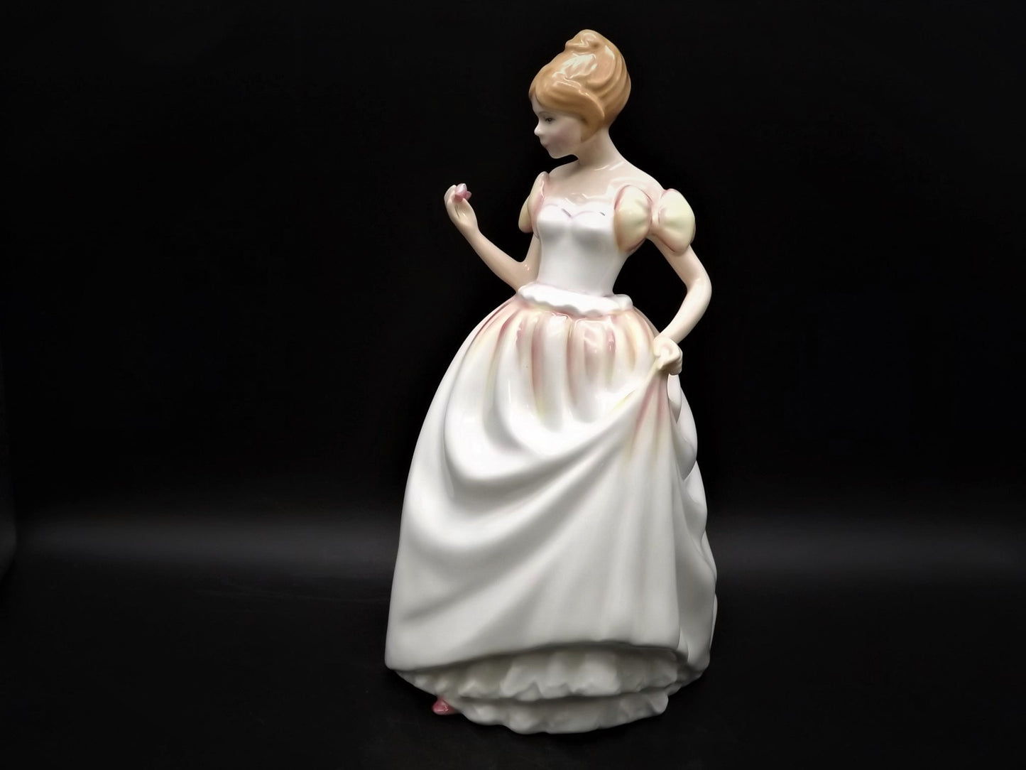 Vintage Royal Doulton "Gift of Love" figurine HN 3427. Excellent condition young lady with a flower!