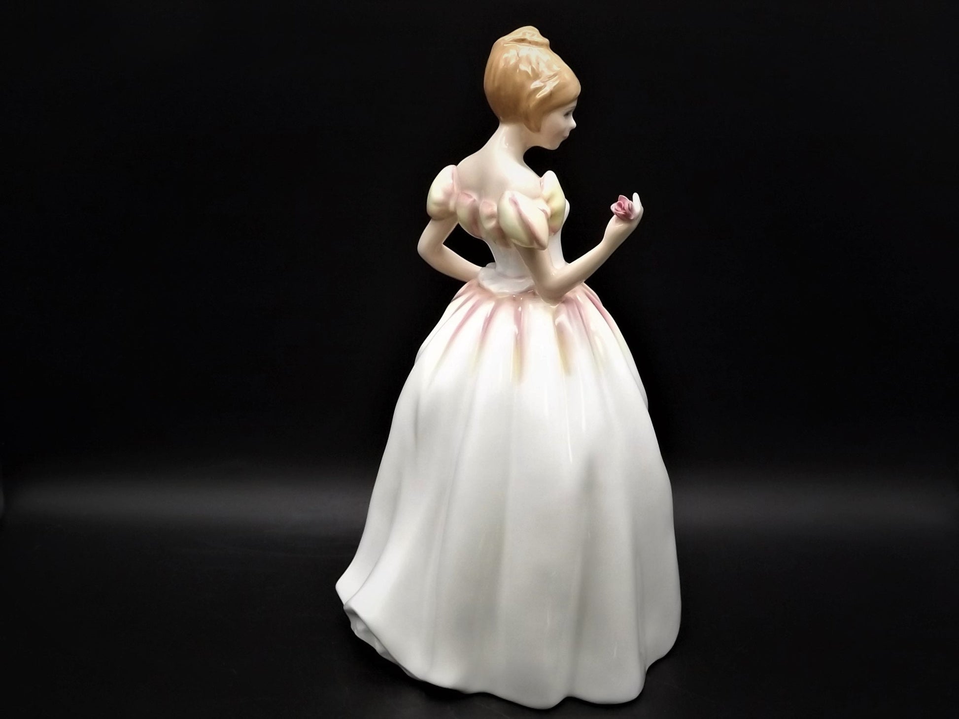 Vintage Royal Doulton "Gift of Love" figurine HN 3427. Excellent condition young lady with a flower!