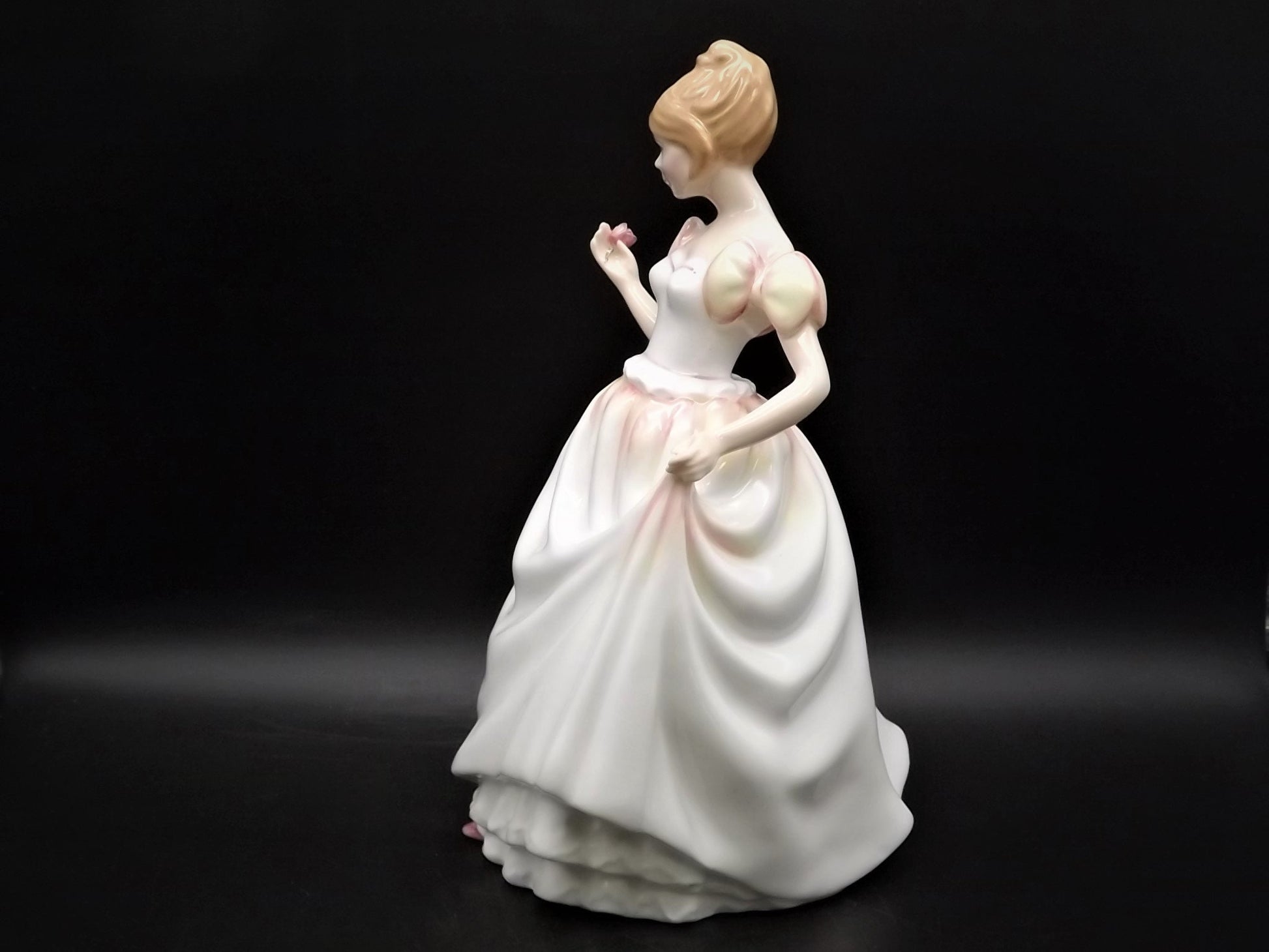 Vintage Royal Doulton "Gift of Love" figurine HN 3427. Excellent condition young lady with a flower!